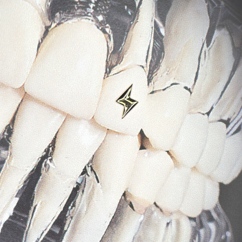 18K Gold Tooth Gem – Bolt